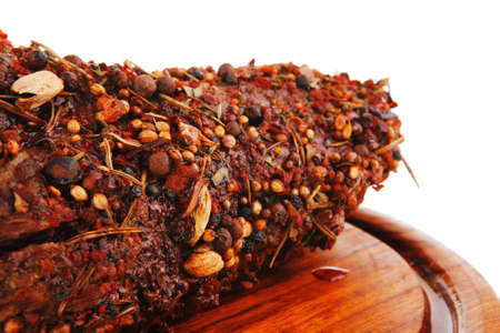 grilled beef meat in spices over whiteの写真素材