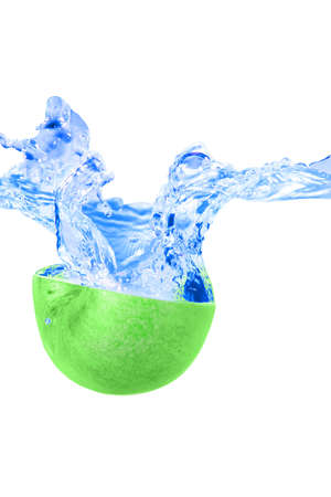 apple fall in real blue water splash isolated over white backgroundの写真素材