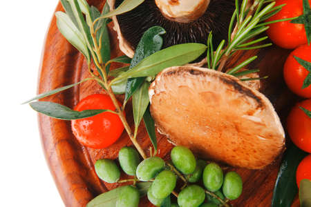 fresh vegetables on wood over white backgroundの写真素材