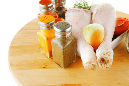 image of fresh raw chiken legs and spicesの写真素材