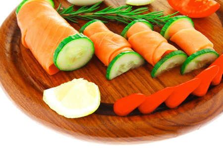 image of smoked salmon slices on dark woodの写真素材