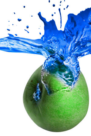 apple fall in real blue water splash isolated over white backgroundの写真素材