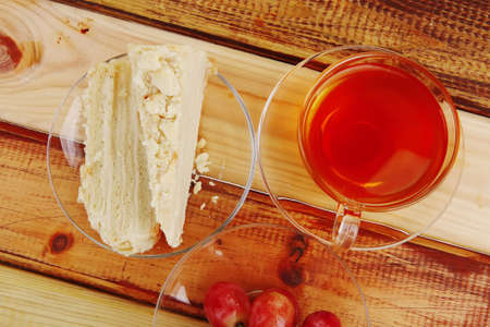 cake dessert and tea on wooden table