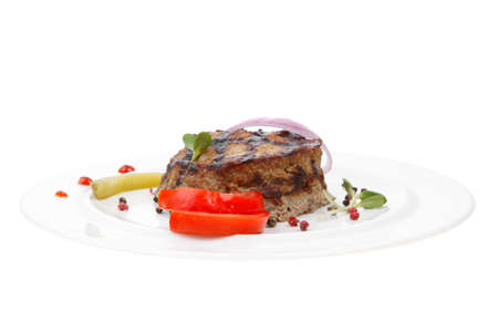 extra thick hot beef meat hamburger dinner on white plate with tomatoes salad and ketchup isolated on white backgroundの写真素材