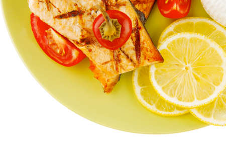 pink salmon and french cheeses on greenの写真素材