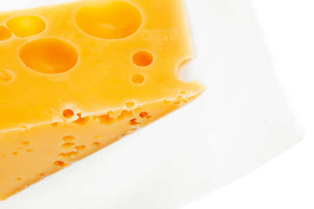 french gourmet parmesan cheese  on china plate isolated over white backgroundの写真素材