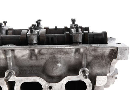 real used car motor head engine four cylinder isolated over white の写真素材