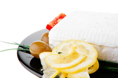 image of feta cube on black plateの写真素材