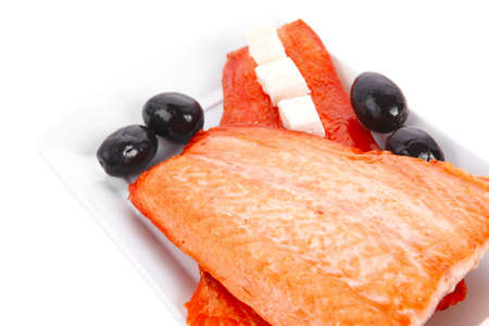 fresh grilled salmon meat fillet with goat light greek feta cheese black olives and tomatoes over...