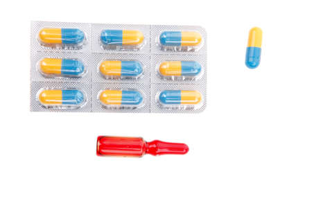different drugs in tablets and ampules isolated over white background