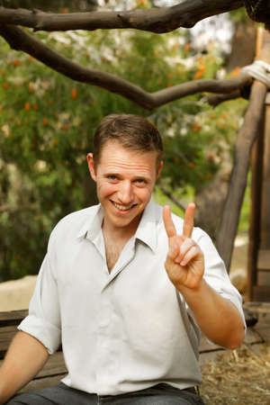 young happy white caucasion man taste and enjoy red wine outdoor in in countryside   classic style fashion の写真素材