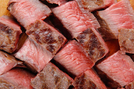 american meat : big rare roast steak on wood isolate on white backgroundの写真素材