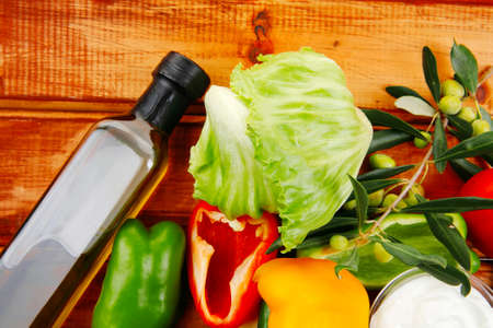 prepared vegetables on wood with sour creamの写真素材