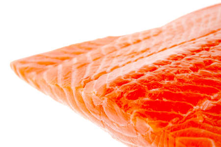 piece of big salmon fillet over white