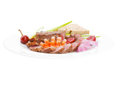 meat food : grilled fat meat served on white plate with tomatoes , sprouts and bread isolated on white backgroundの写真素材