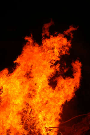 red fire tongue on black background
