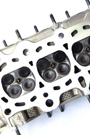 real used car motor engine part isolated on white backgroundの写真素材