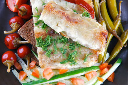 traditional italian cannelloni with fresh tomato cherry peppersの写真素材