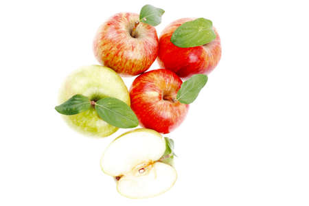 Group of red and green fresh ripe apples with half isolated over white の写真素材