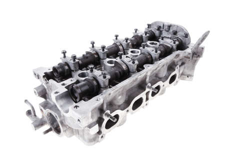 real used car motor head engine four cylinder isolated over white backgroundの写真素材