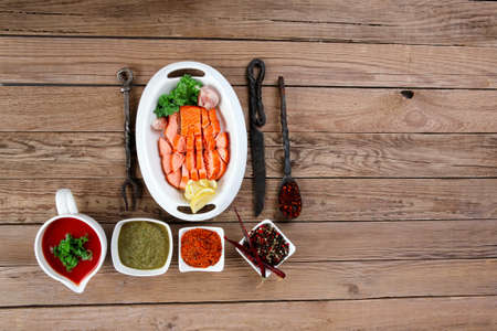 breakfast delicious portion of fresh roast salmon fillet with green chili sauce tomato soup dry...