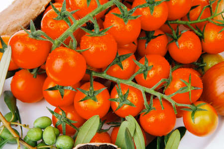 raw vegetables on plate ready for processの写真素材