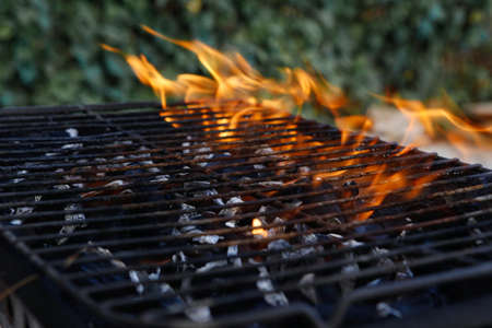 black burned charcoal bbq grid fire natural as background