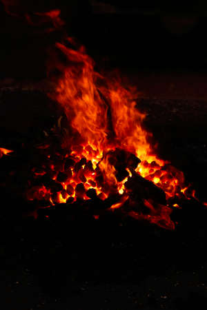 image of stone charcoal fire on bugle as abstract background