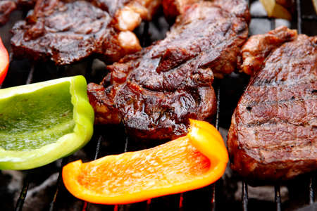 ready grilled fillet mignon served with garnish of eggplants on barbecue bbq grill