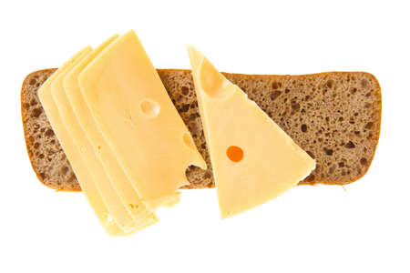 yellow fromage french cheese bar and slice on rye bread isolated over white backgroundの写真素材
