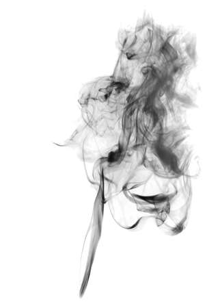 dark textured smoke powder fluffy puffs explosion dust isolated on white background as brushの写真素材