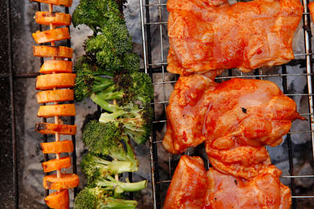 fresh chicken breast meat with vegetable kebab cooked on bbq grid の写真素材
