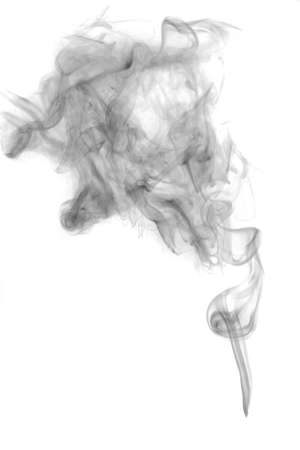 dark textured smoke powder fluffy puffs explosion dust isolated on white background as brushの写真素材