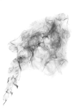 dark textured smoke powder fluffy puffs explosion dust isolated on white background as brushの写真素材