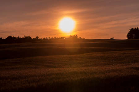 Sunset over farm field in Northern Wisconsinの写真素材