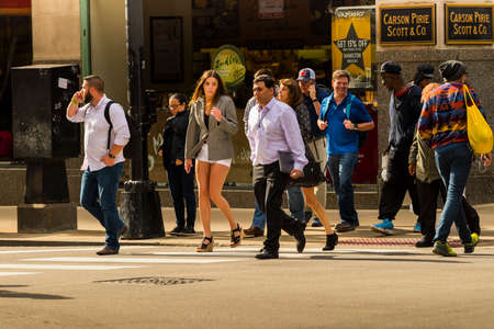 CHICAGO - May 29, 2019: People of Chicago crossing West Monroe Street and South Wabash Avenue.のeditorial素材