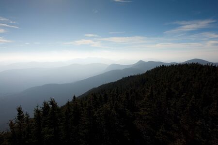 The mountaintops and ridges of the White Mountain National Forest as seen from Mount Carrigainの写真素材