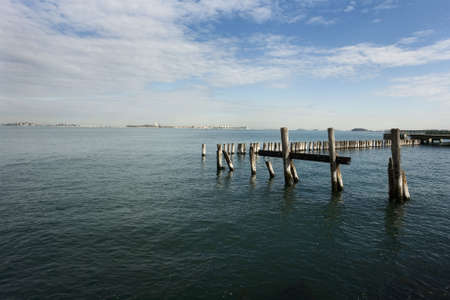 Old pilings at high tideの写真素材