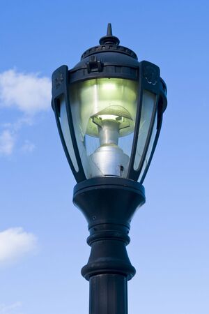 A beaten-up but working streetlightの写真素材