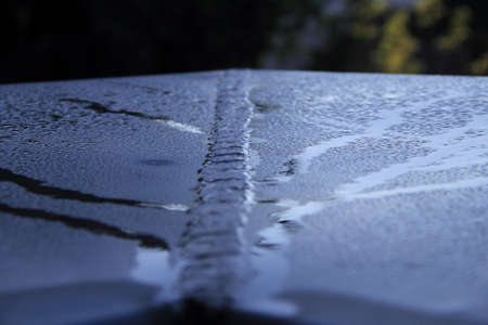 dewdrops on steel texture in the morningの写真素材