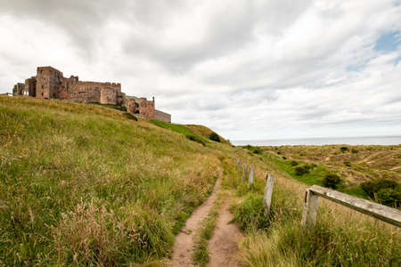 Castle on the hill next to the coastのeditorial素材