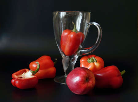Red pepper, Apple and glass jug.の写真素材