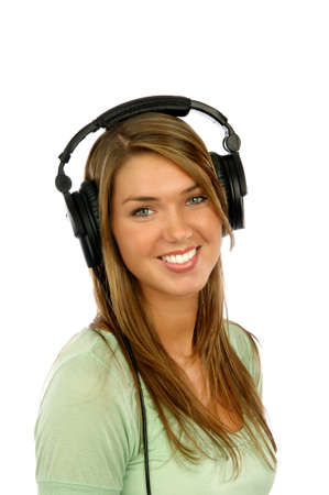 Smiling girl wearing headphonesの写真素材