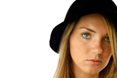 Young girl in a black hatの写真素材