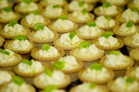 image of mini key lime pies with green candy garnish
