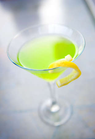 An image of a apple martini with a lemon twistの写真素材