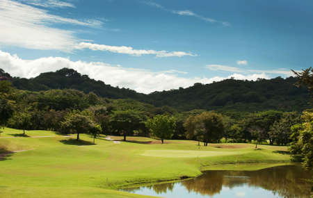 Image of a beautiful golf course fairway at a tropical resortの写真素材