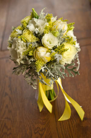 Image of a beautiful floral bouquet on wood tableの写真素材