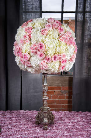 a floral arrangement to be used at a weddingの写真素材