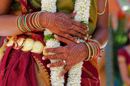 Henna Tattoo's on an Indian bride's handsの写真素材
